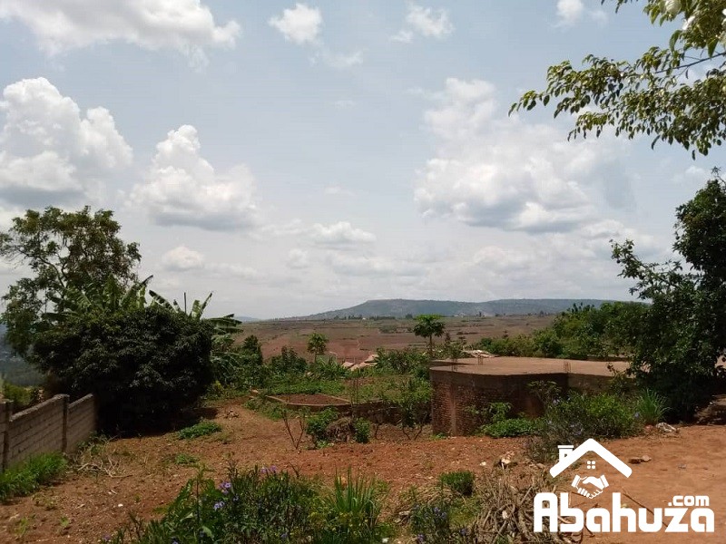 A FENCED BIG PLOT FOR SALE IN KIGALI AT GACURIRO WITH ACCESS ON TWO ROADS